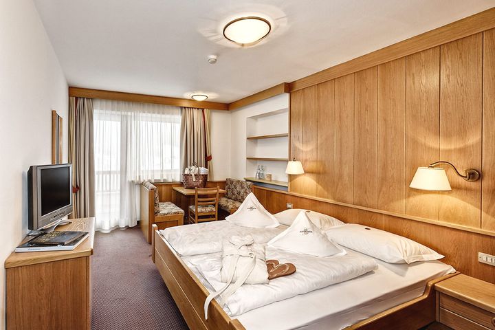 Hotel Alpenheim Charming & Spa preiswert / St. Ulrich Buchung